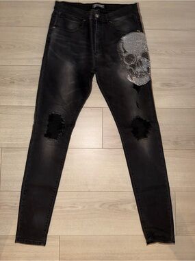Black Skinny Jeans with Silver Sequin Skull Accent